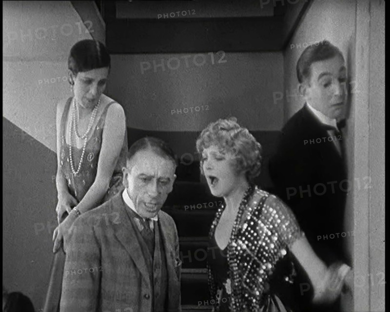 Scene from the Film 'Champagne': Betty Balfour Arguing With Her Companions, 1920s. Creator: British Pathe Ltd.
