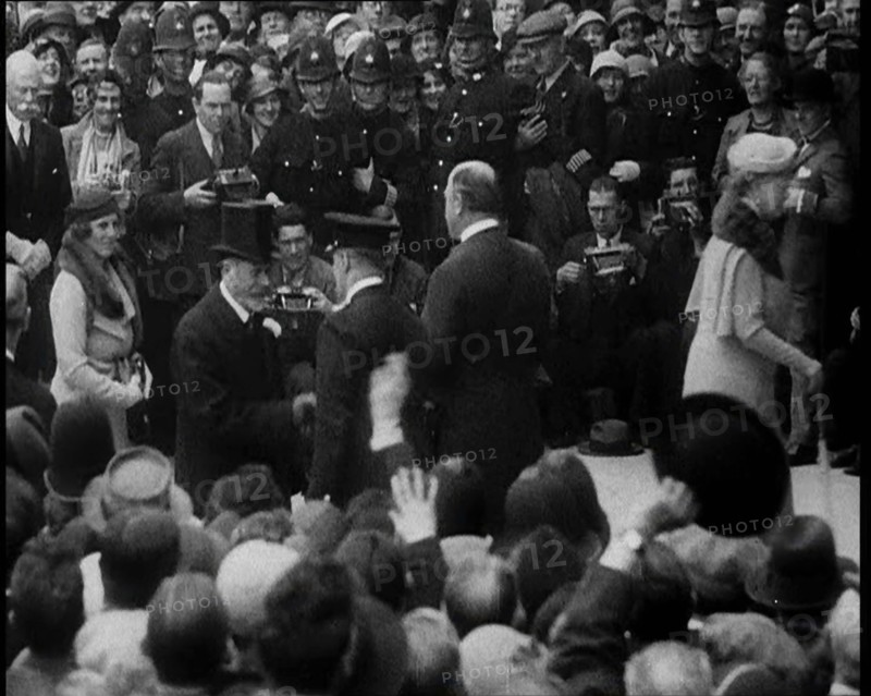 King George V and Other Well Dressed Men and Women Walking Through a Crowd with Photographers...1933 Creator: British Pathe Ltd.