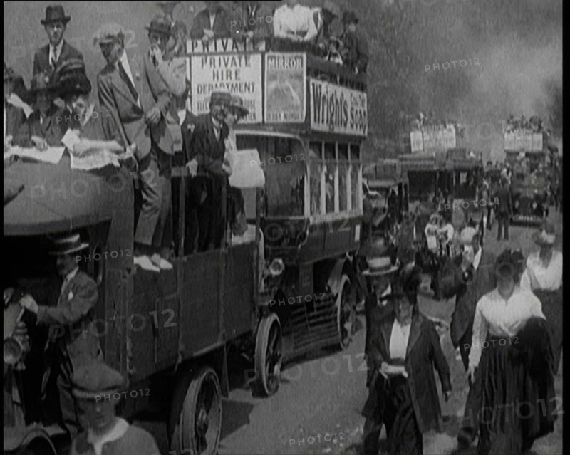 Cars, Buses and Pedestrians Arriving for the 1920 Epsom Derby, 1920. Creator: British Pathe Ltd.