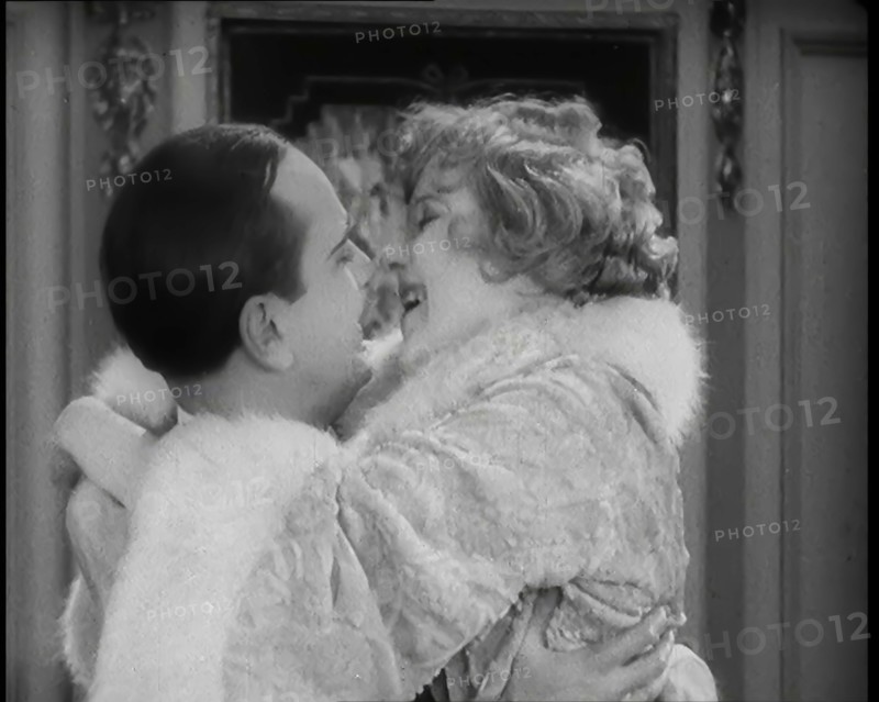 Scene from the Film 'Champagne': The Actress Betty Balfour Embracing the Male Actor Jean..., 1920s. Creator: British Pathe Ltd.