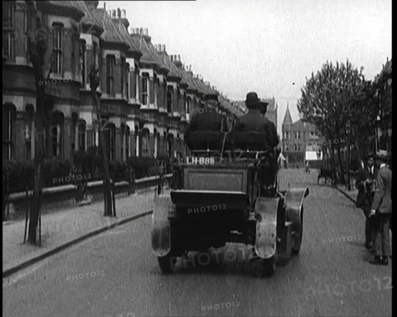 Fire Engine Driving Down the Street, 1920. Creator: British Pathe Ltd.