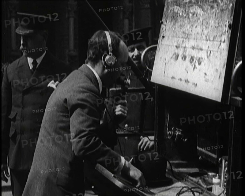British Radio Operator Working at the Rear of a Fire Engine, 1920. Creator: British Pathe Ltd.