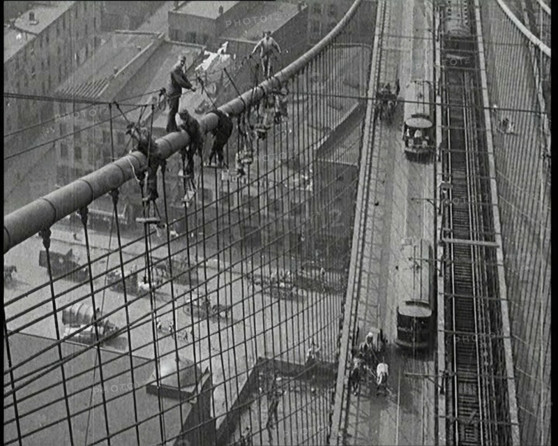 Men Painting the Brooklyn Bridge in New York City, 1922. Creator: British Pathe Ltd.