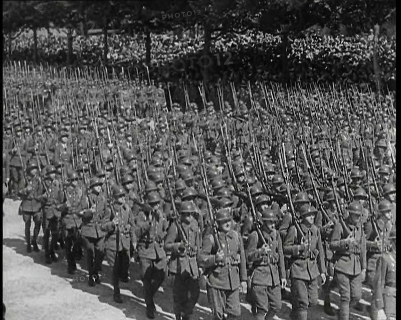 Lines of Male French Soldiers Marching Down the Champs Elysees During a Bastille Day..., 1939. Creator: British Pathe Ltd.