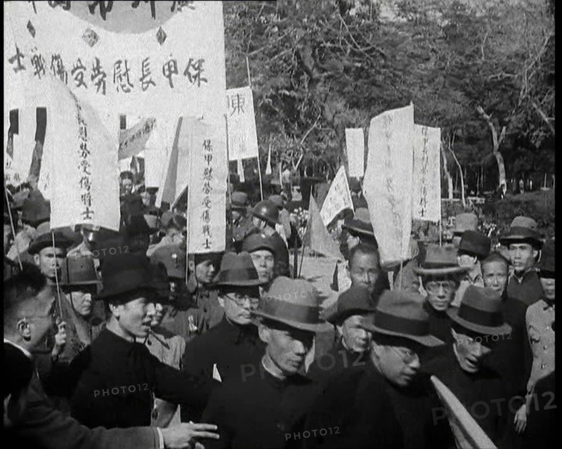 A Chinese Anti-War Protest With Male Attendees Both Military and Civilian Present Some..., 1938. Creator: British Pathe Ltd.