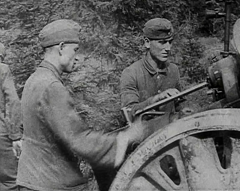 German Soldiers Operating an Artillery Gun, 1941. Creator: British Pathe Ltd.