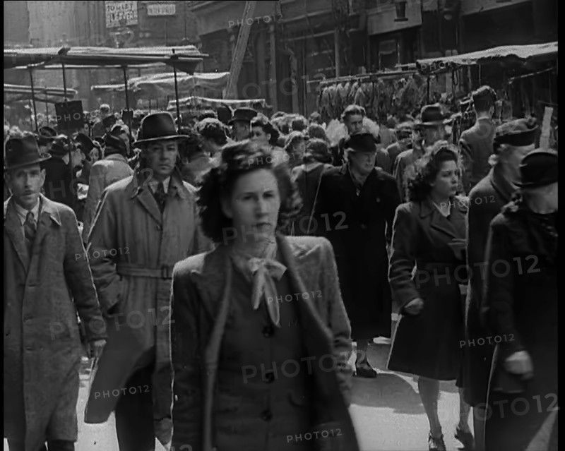 People Moving Along Crowded Streets, 1940. Creator: British Pathe Ltd.