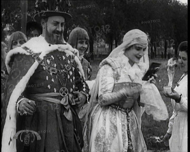 The Actor Henny Porten Dressed in Period Costume Putting on Make up from a Powder Compact..., 1920s. Creator: British Pathe Ltd.