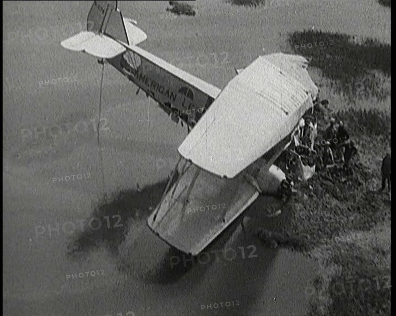 Bystanders Looking at the Wreckage of 'The American Legion' After It Had Crashed, 1927. Creator: British Pathe Ltd.