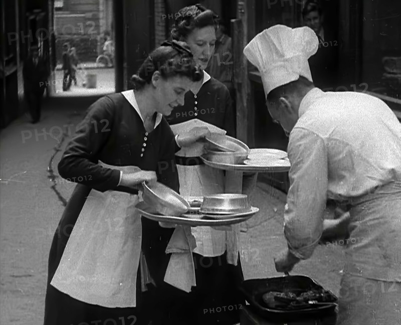People Preparing Food, 1941. Creator: British Pathe Ltd.