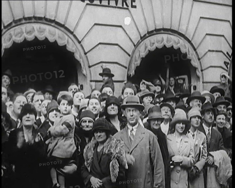 Press and Members of Public Watching Charles Lindbergh and Anne Morrow Lindbergh Waving..., 1920s. Creator: British Pathe Ltd.