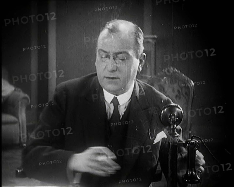 The Producer Julian Wylie Speaking on a Telephone, 1920s. Creator: British Pathe Ltd.