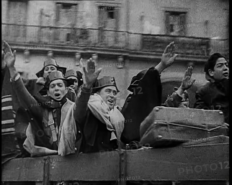 Spanish Fighters on the Back of a Lorry Making Fascist Salutes and Celebrating the Victory..., 1939. Creator: British Pathe Ltd.