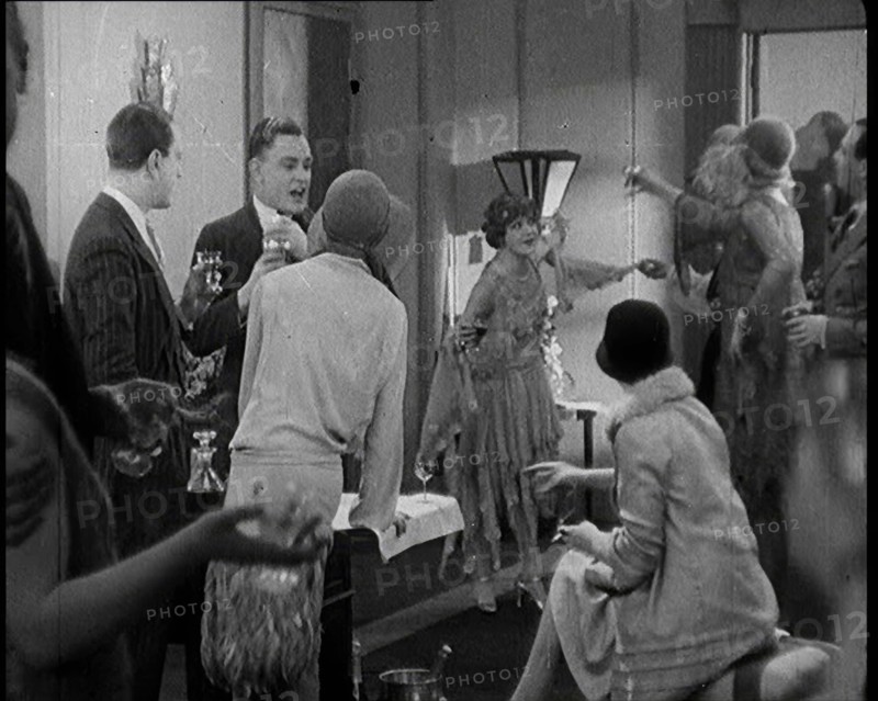 Scene from a 1920s Film. A Group of Actors Playing Bright Young Things Having a Cocktail Party,1920s Creator: British Pathe Ltd.