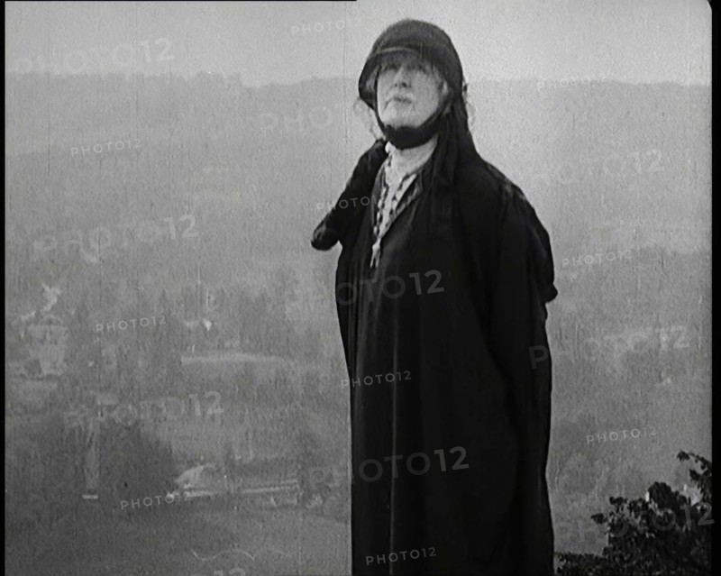 Dame Ellen Terry Standing on a Hill Looking at the View, 1920s. Creator: British Pathe Ltd.