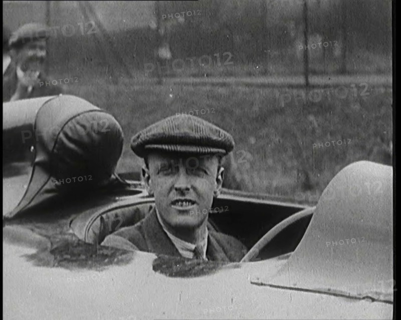 Sir Henry Segrave AKA Major Segrave's Climbing Into 'Sunbeam' Watched By a Crowd of Civilians, 1927. Creator: British Pathe Ltd.