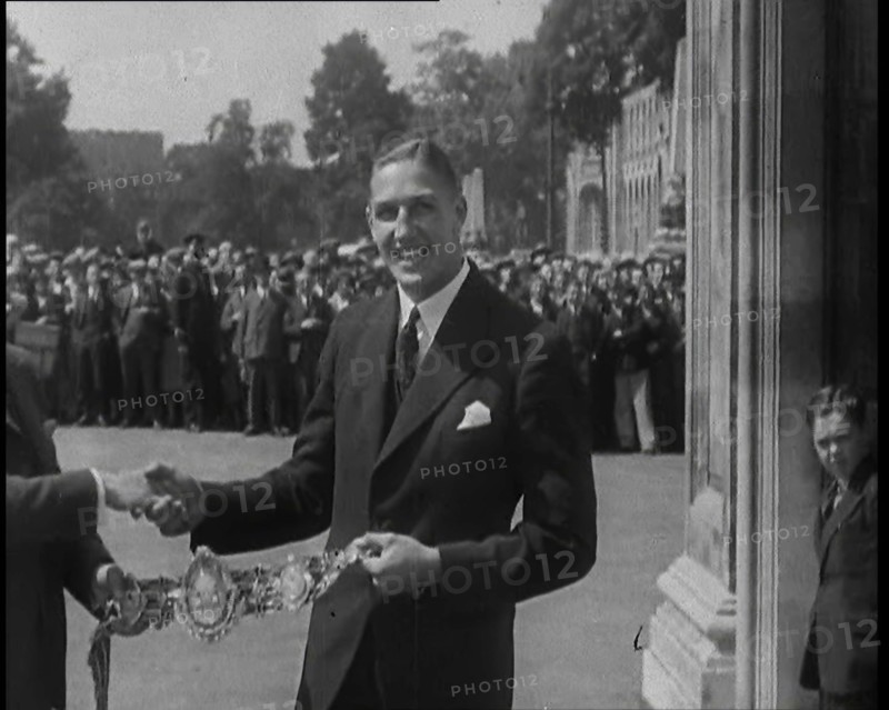 Boxer, Jack Petersen Accepting a Boxing Award Belt, 1930s. Creator: British Pathe Ltd.