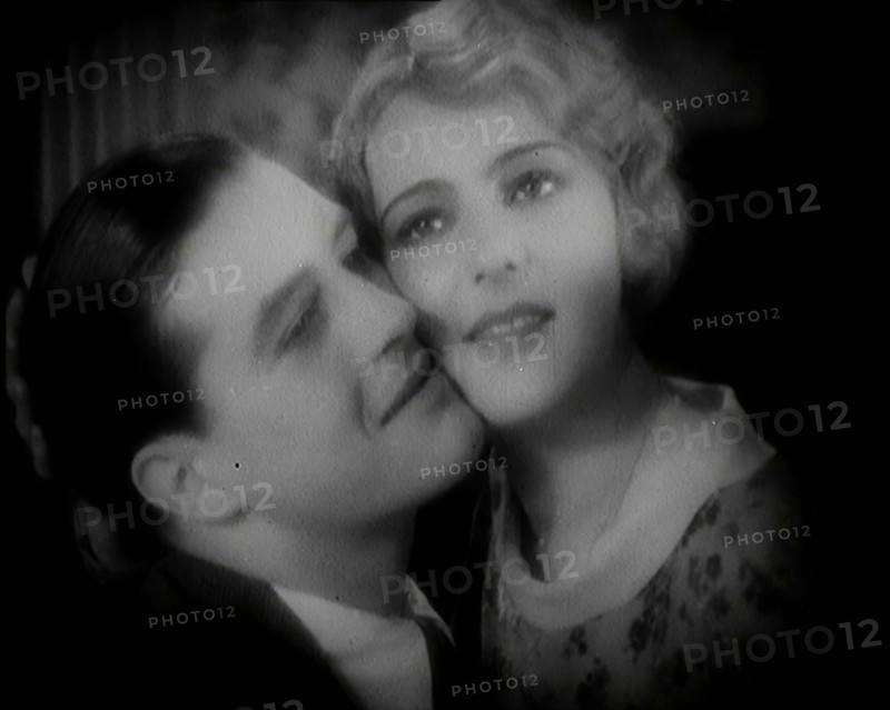 The Actor Ray Milland Embracing a Female British Actor, 1920s. Creator: British Pathe Ltd.