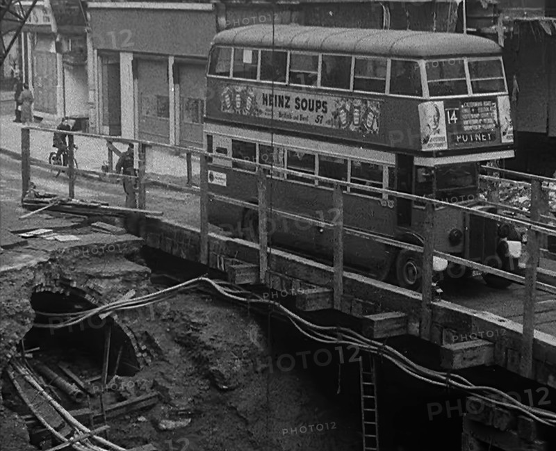 A Bus Driving Across a Wooden Bridge, 1940. Creator: British Pathe Ltd.