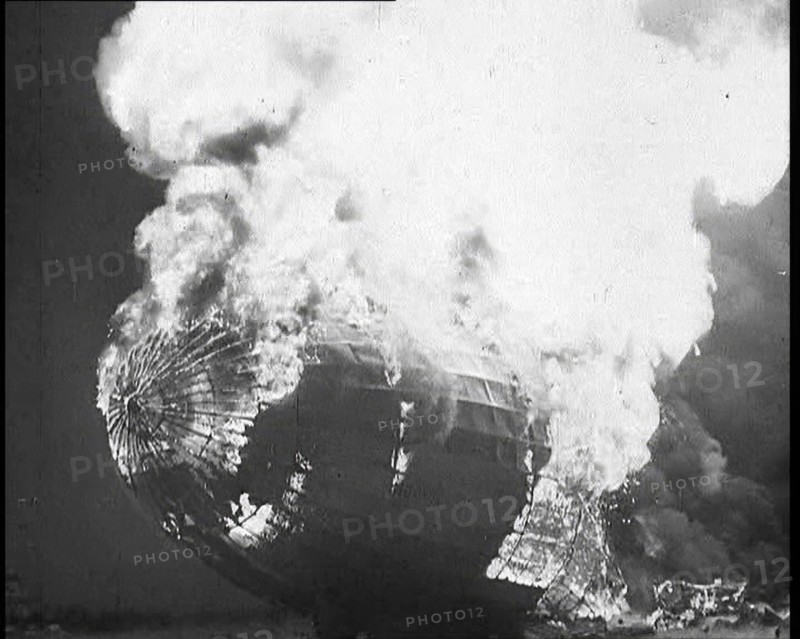 The German Airship, the Hindenburg, its Rear Half Destroyed And Obscured By Smoke With..., 1937. Creator: British Pathe Ltd.