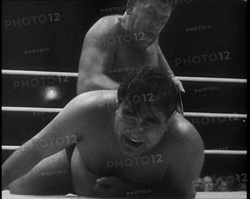 Spectators Watching a Wrestling Match, 1930s. Creator: British Pathe Ltd.