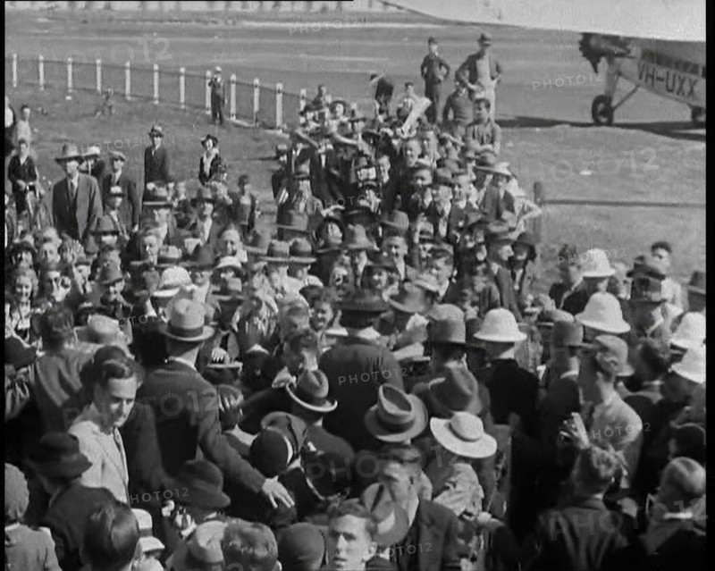 Jean Batten Walking Through a Crowd, 1930s. Creator: British Pathe Ltd.