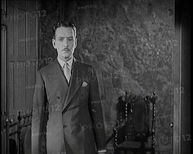 An Extract from a Silent Film. A Male Actor Enters Through a Door, 1920s. Creator: British Pathe Ltd.