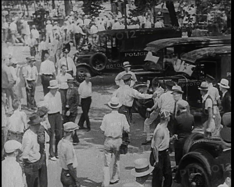 Police Officers Confronting Protesting Soldiers  To Disperse the Army Veterans, 1932. Creator: British Pathe Ltd.
