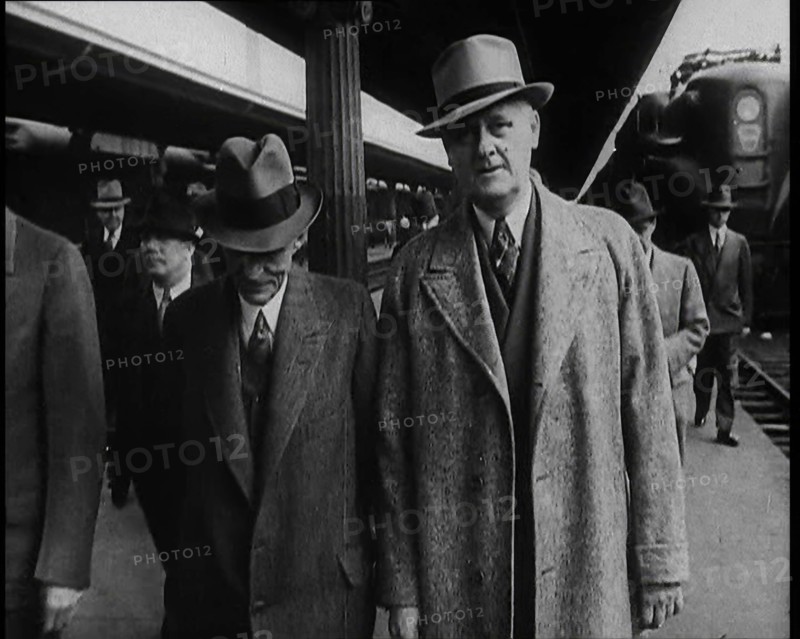 Henry Ford and His Entourage Walking Towards the Camera, 1930s. Creator: British Pathe Ltd.