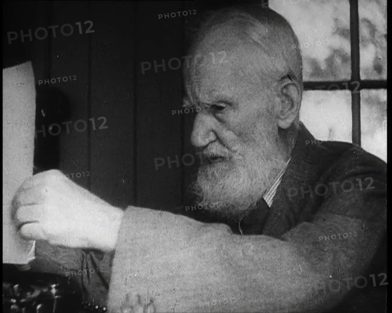 George Bernard Shaw Setting up a Typewriter, 1930s. Creator: British Pathe Ltd.
