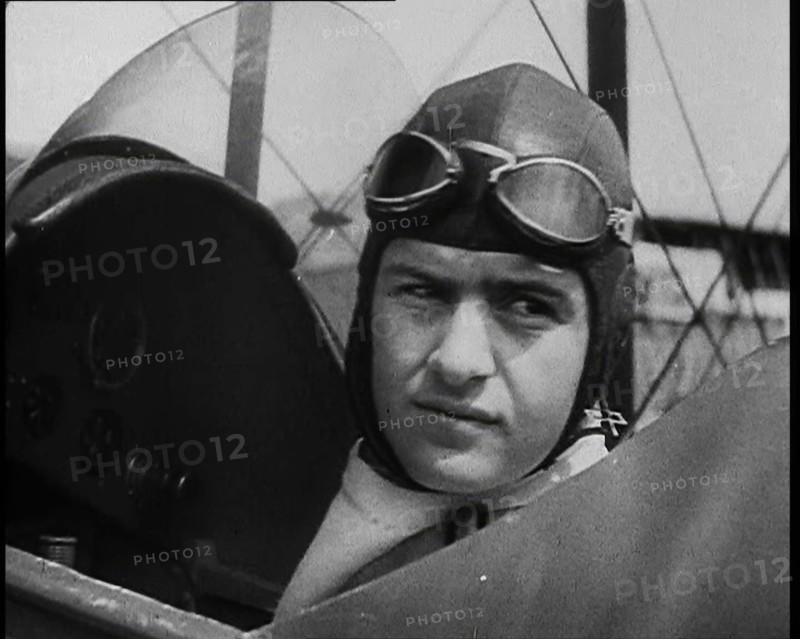 Bruno Mussolini, Son of Italian Leader Benito Mussolini, in Flying Cap Sitting in the..., 1937. Creator: British Pathe Ltd.