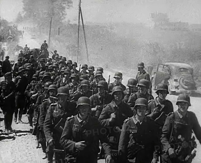 German Soldiers Marching Down a Road, 1941. Creator: British Pathe Ltd.