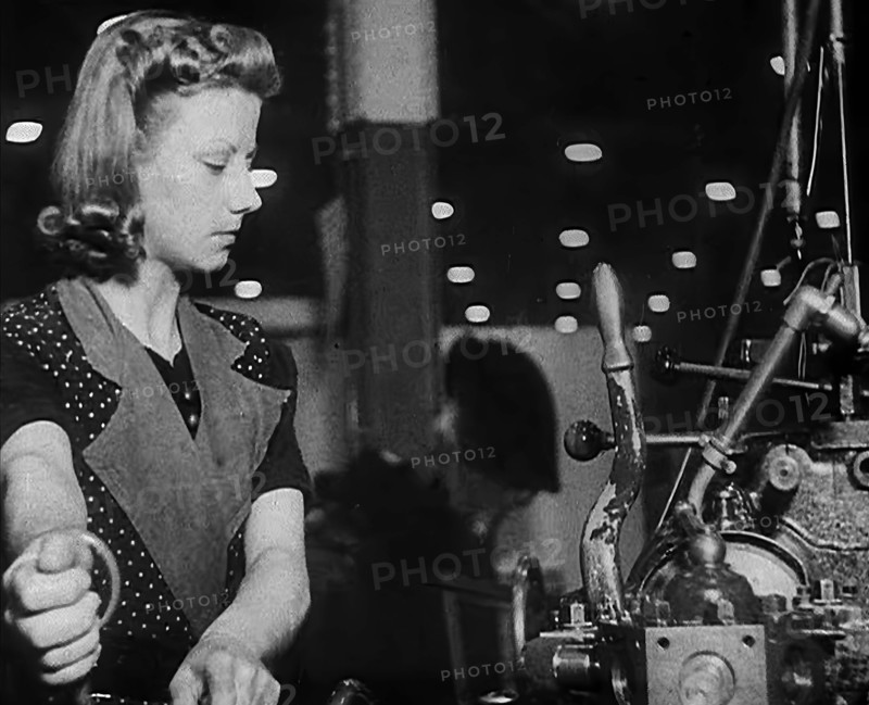 Woman Working in a Factory, 1940. Creator: British Pathe Ltd.