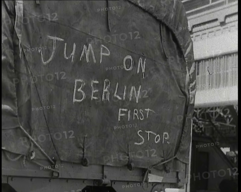 Chalk Graffiti on the Tarpaulin Covering a Lorry Reading 'JUMP on BERLIN FIRST STOP', 1939. Creator: British Pathe Ltd.