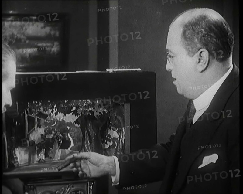 The Producer Julian Wylie Choosing Set a Design for a Theatre Show, 1920s. Creator: British Pathe Ltd.