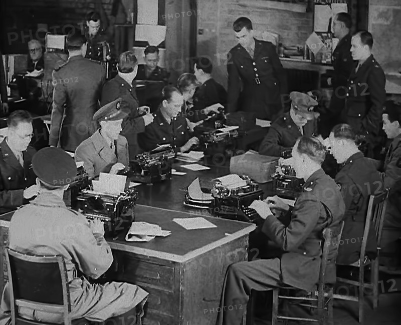 Uniformed Press Officers Working, 1943. Creator: British Pathe Ltd.
