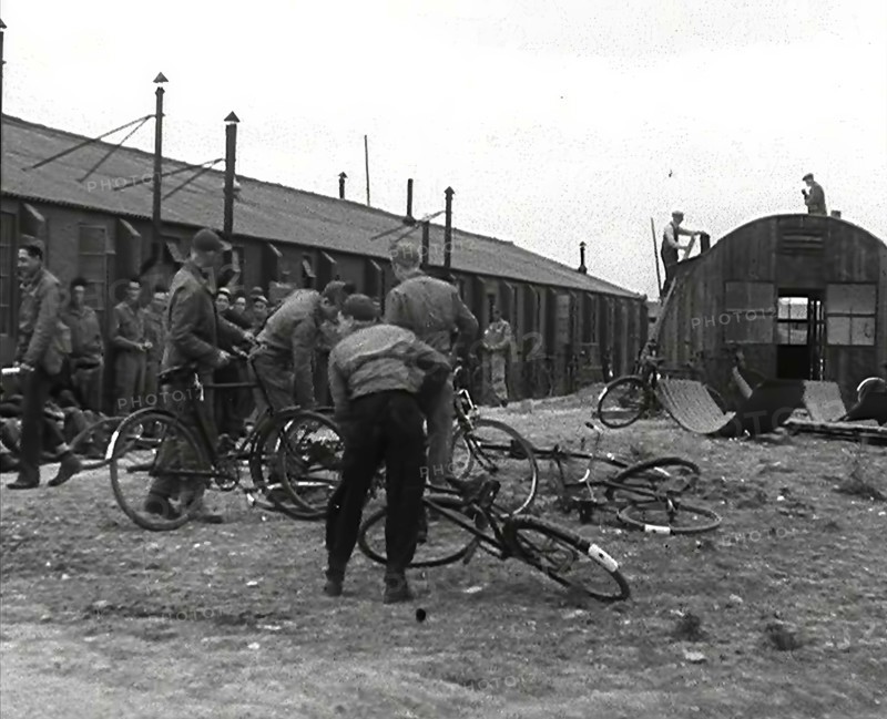 American Airmen Queueing up Outside a Building at an Airfield in England, 1943-1944. Creator: British Pathe Ltd.