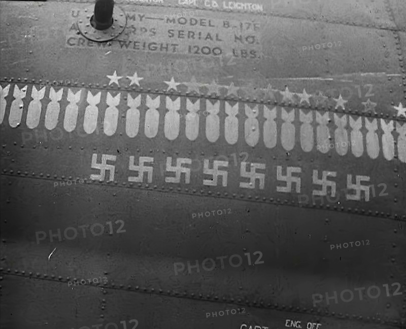 Swastika and Bomb Images Painted on the Fuselage of a Bomber Aircraft, 1943-1944. Creator: British Pathe Ltd.