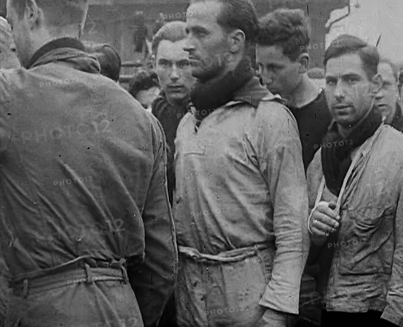 Crew of the Destroyed Bismarck Entering Captivity, 1943. Creator: British Pathe Ltd.