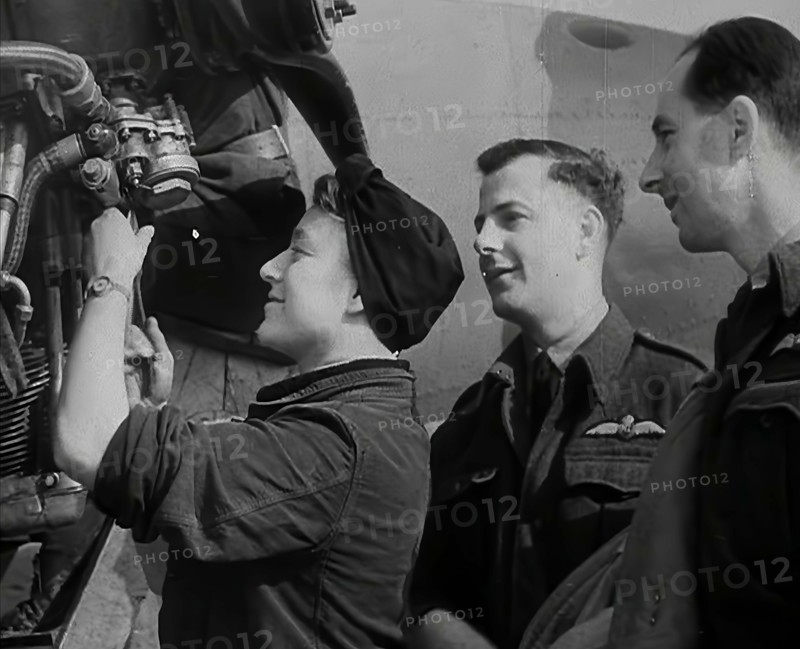 People Inspecting Part of an Aeroplane, 1942. Creator: British Pathe Ltd.