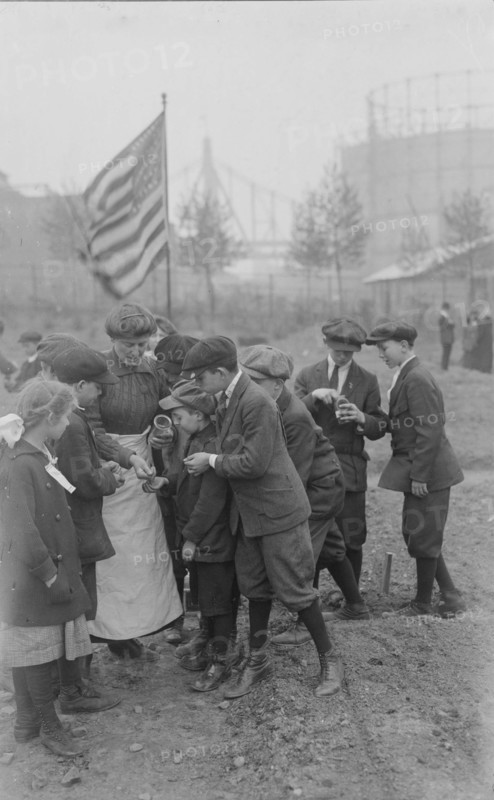 Seed distribution, Rockefeller Garden, 1917. Creator: Bain News Service.