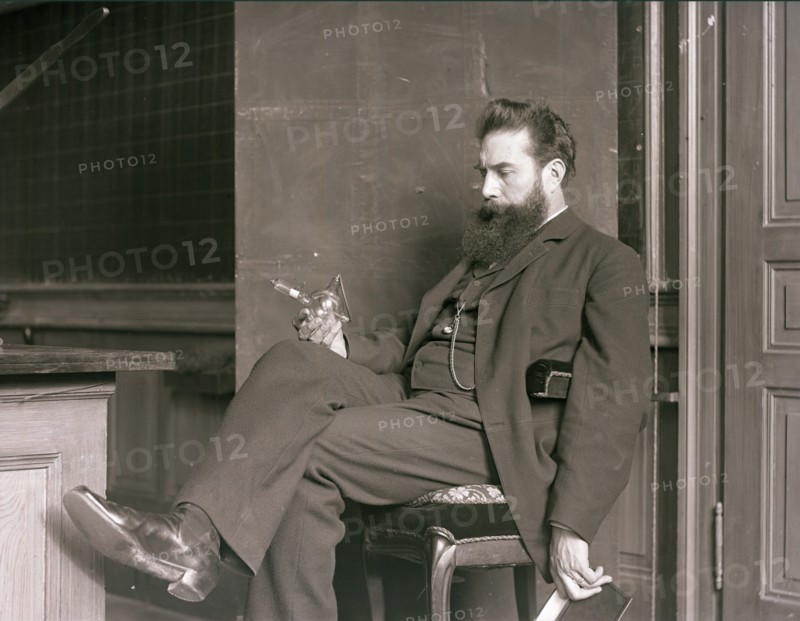 Wilhelm Conrad Röntgen in his laboratory, 1896. Creator: Anonymous.