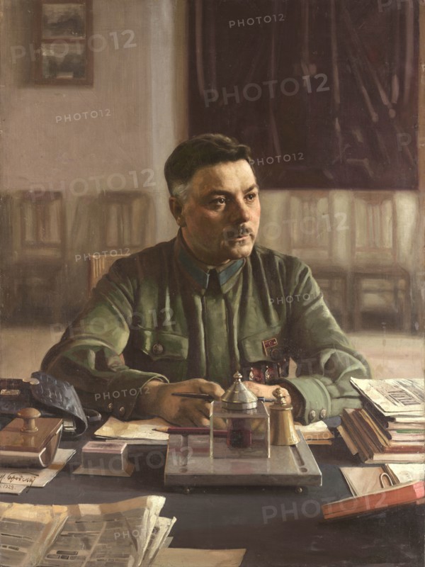 Portrait of Kliment Voroshilov (1881-1969) in his Office, 1929. Creator: Brodsky, Isaak Izrailevich (1884-1939).