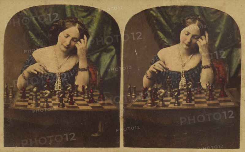 Woman playing chess by herself, about 1860. Creator: Ledot.