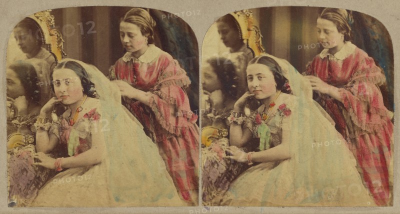 Woman seated being attended by another, about 1865. Creator: London Stereoscopic & Photographic Co.