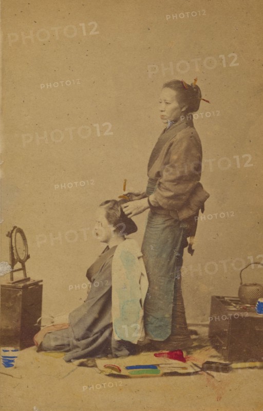 Female hair dresser, 1870-1880. Creator: Unknown.