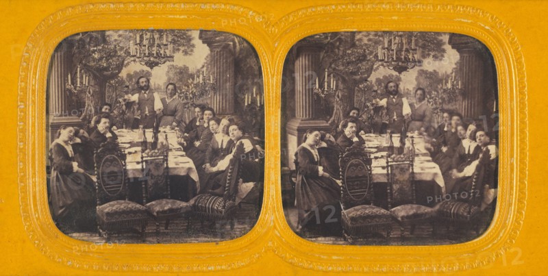 Group of people seated around a dining table, 1860s. Creator: E Lamy.