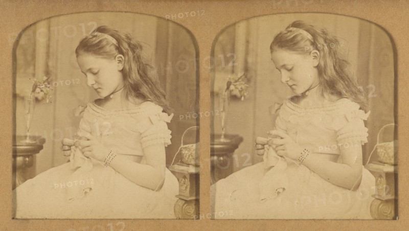 Little girl sewing, 1855-1865. Creator: F. Grau.