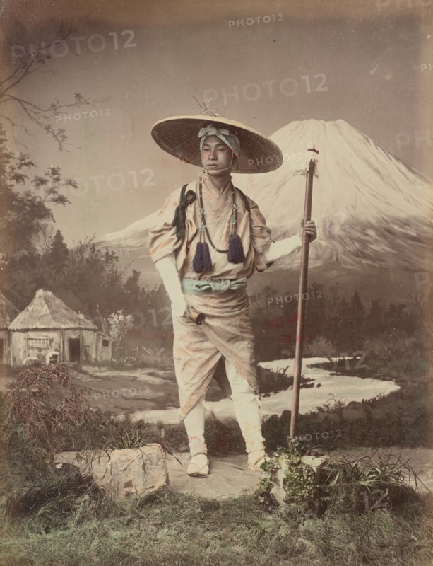 Pilgrim Going Up Fujiyama, 1870s-1890s. Creator: Kusakabe Kimbei.
