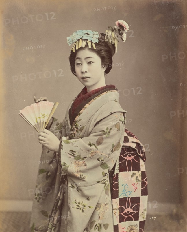 Young Woman with Fan, 1870s-1890s. Creator: Kusakabe Kimbei.